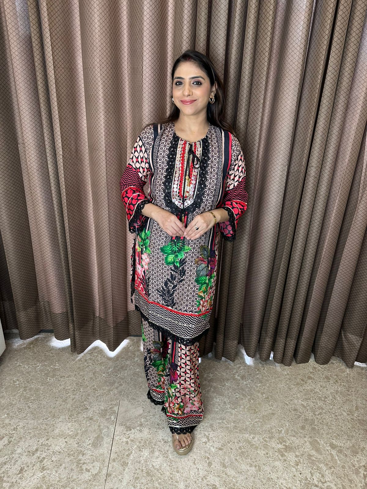 Multicolor Printed Suit Set with Embroidered Neckline & Dupatta with Potli