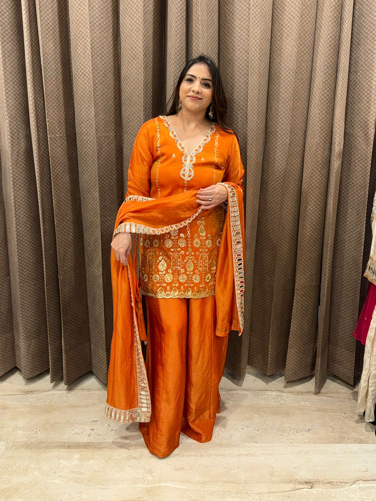 Rust Orange Embroidered Sharara Set with Dupatta & Potli