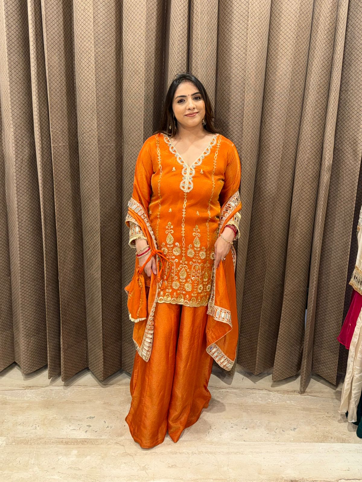 Rust Orange Embroidered Sharara Set with Dupatta & Potli