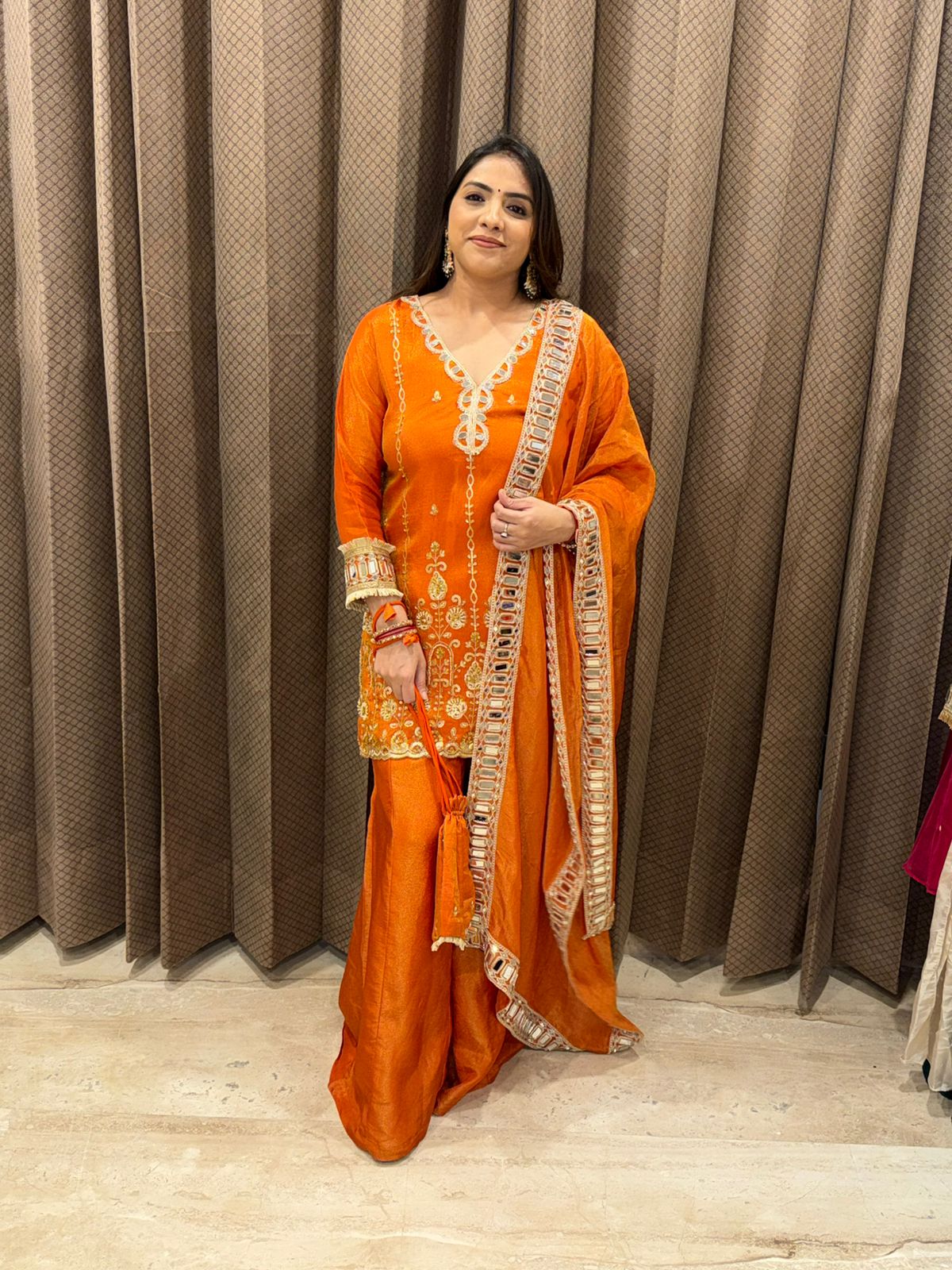 Rust Orange Embroidered Sharara Set with Dupatta & Potli