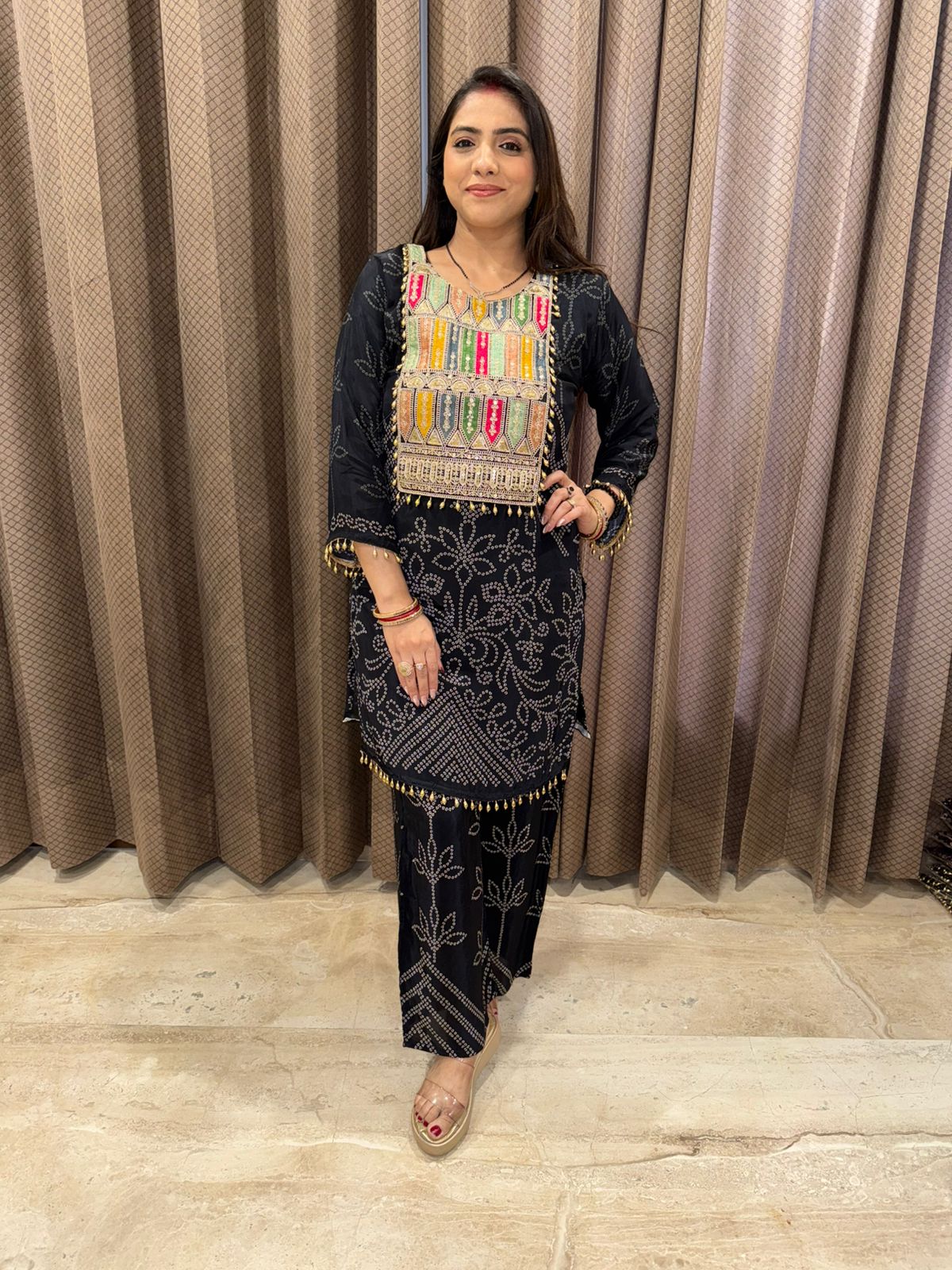 Black Bandhani Printed Co-ord Set with Multicolor Embroidered Yoke and Tassel Detailing