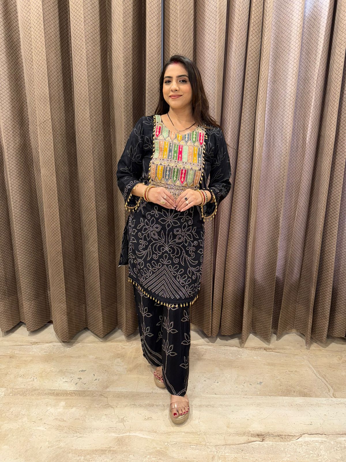 Black Bandhani Printed Co-ord Set with Multicolor Embroidered Yoke and Tassel Detailing