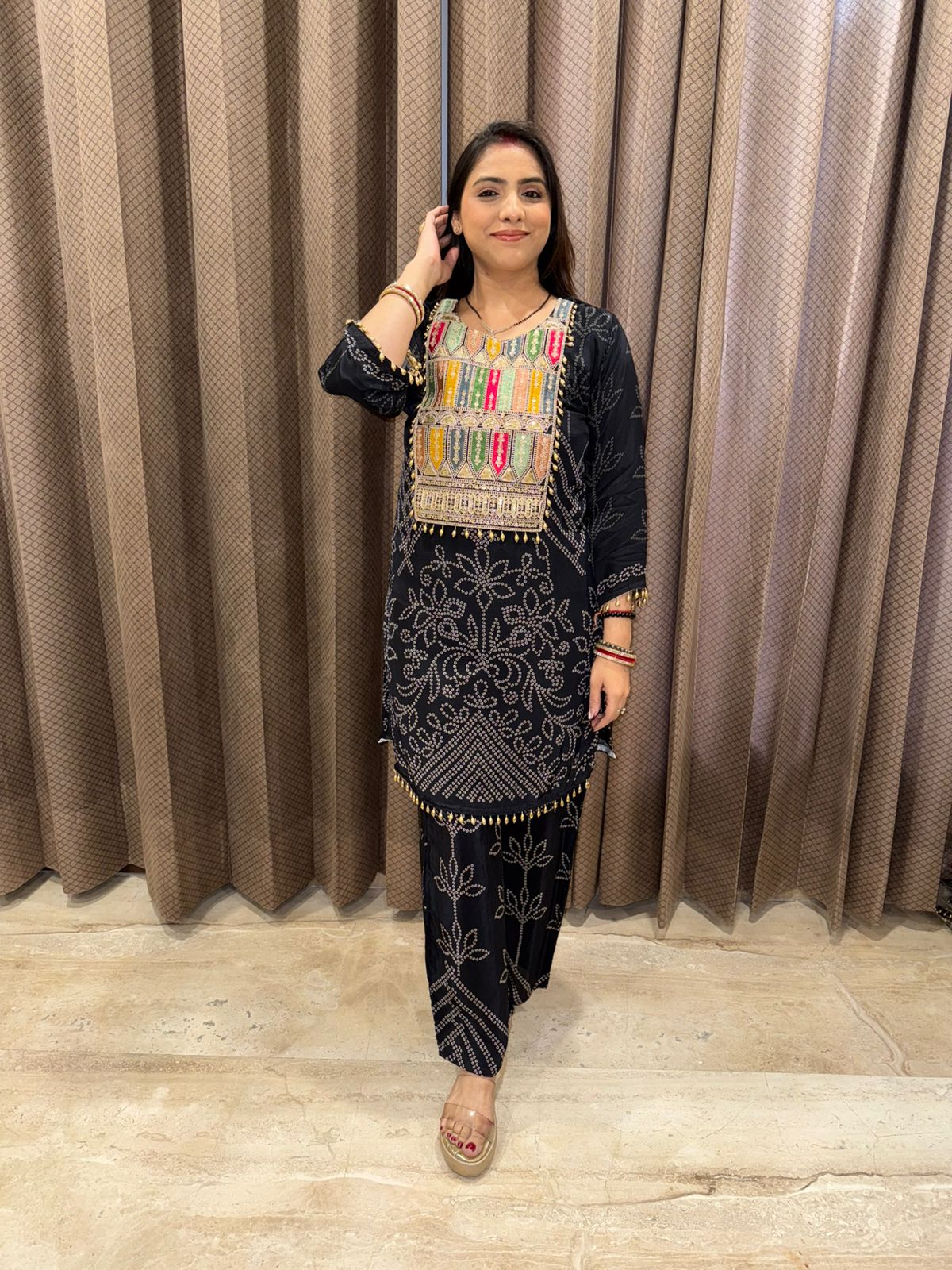 Black Bandhani Printed Co-ord Set with Multicolor Embroidered Yoke and Tassel Detailing