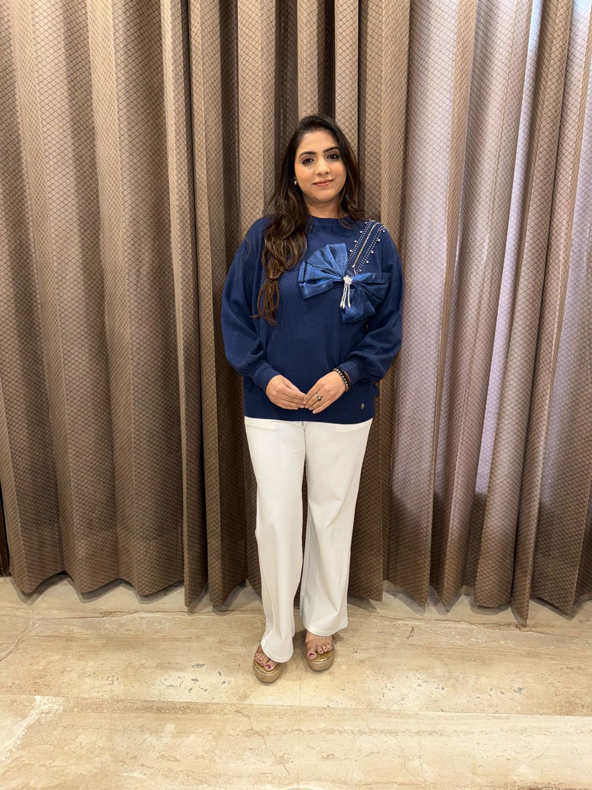 Stylish Navy Blue Sweatshirt with Bow and Pearl Detailing