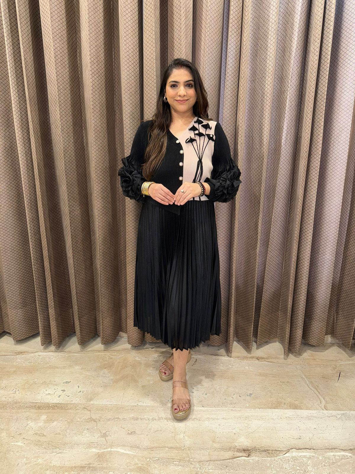 Black Pleated Dress with Ruffled Sleeves and Buttoned Detail