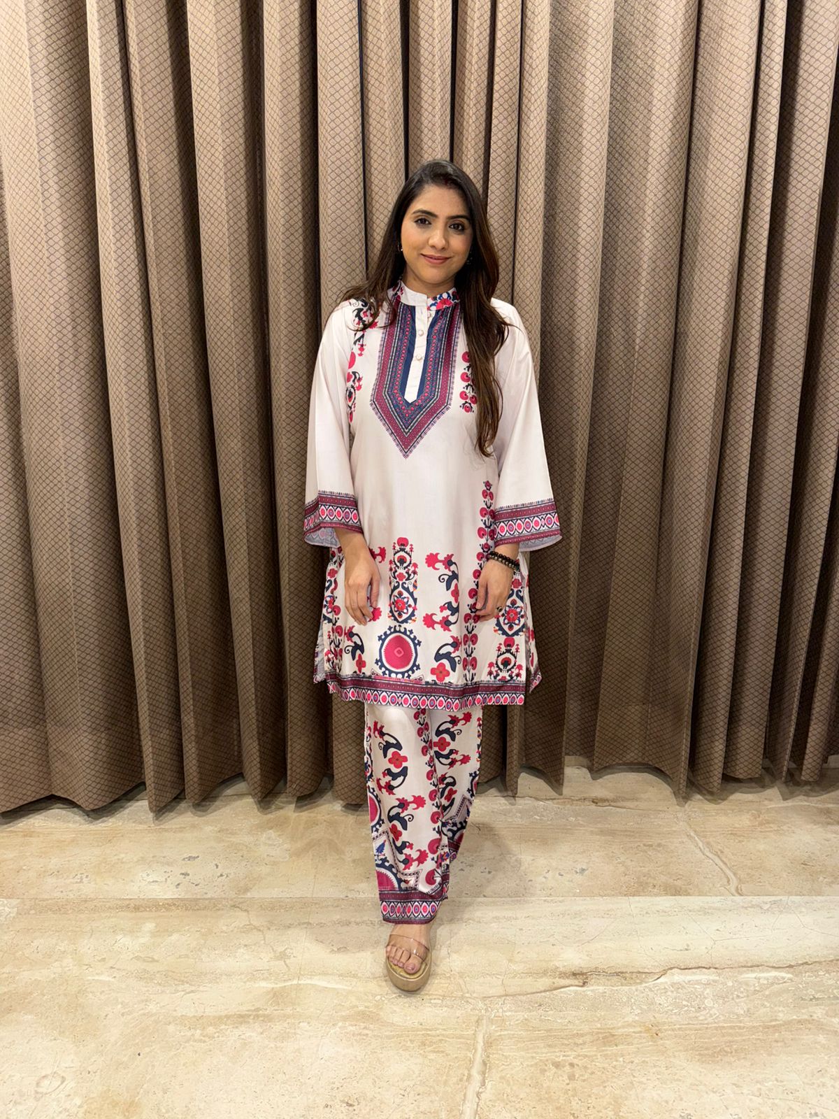 White Folk-Inspired Print Kurta Set with Statement Neck Design