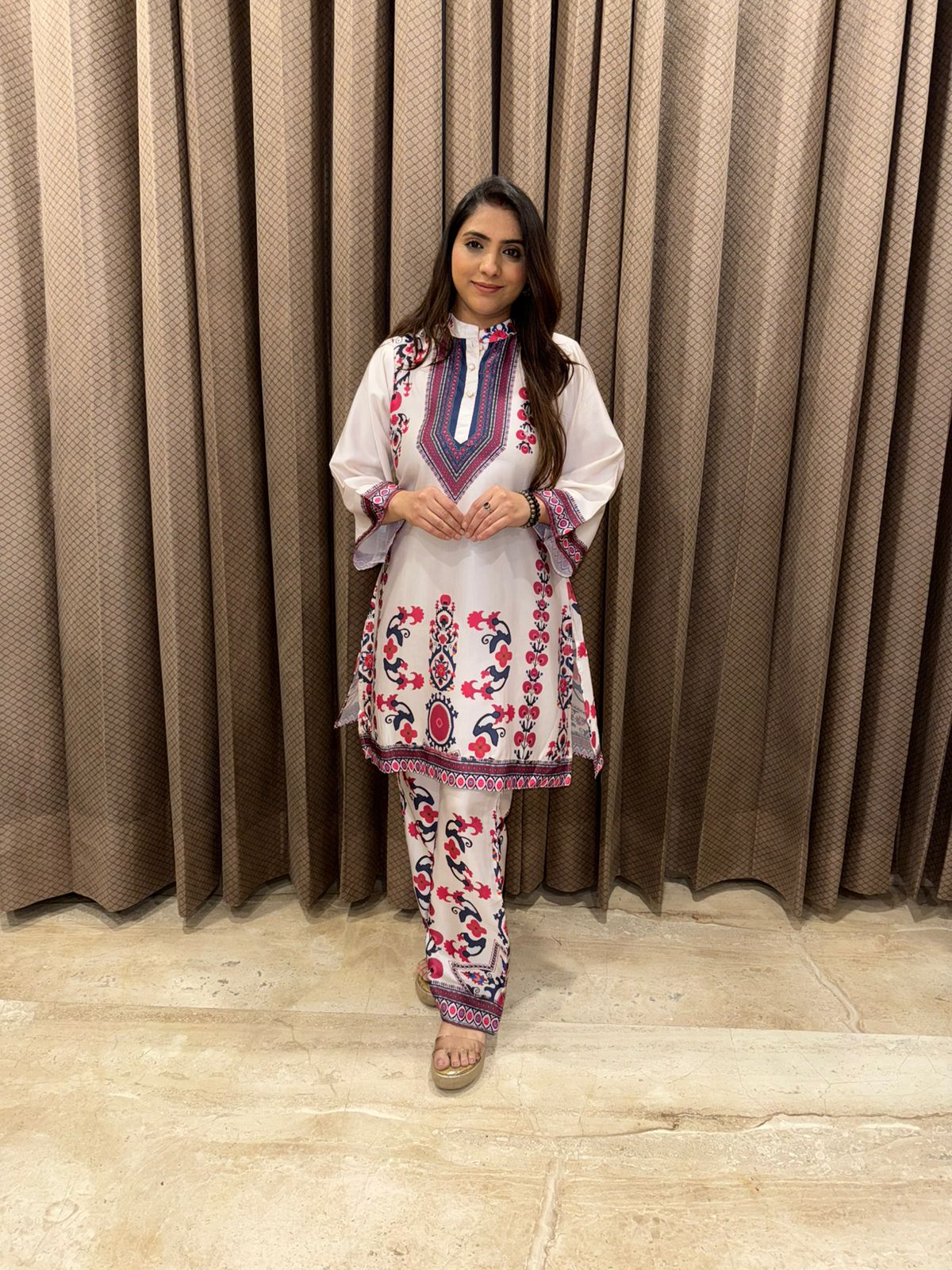 White Folk-Inspired Print Kurta Set with Statement Neck Design