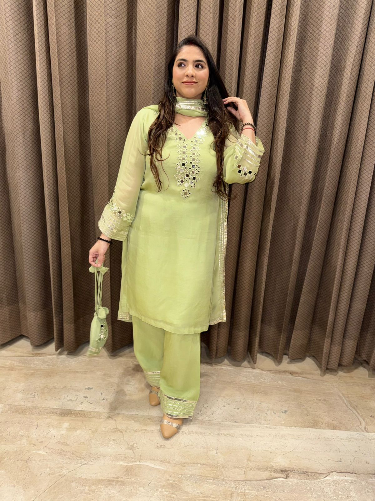 Designer Kurta set with mirror Handwork & Potli