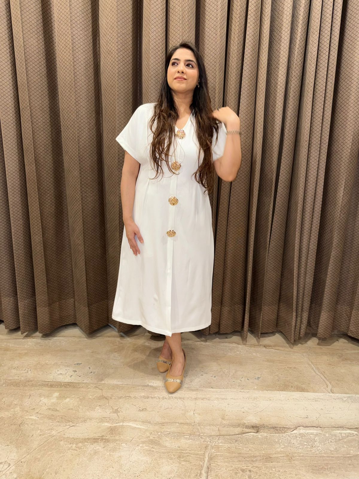 Beautiful White One piece dress with designer buttons