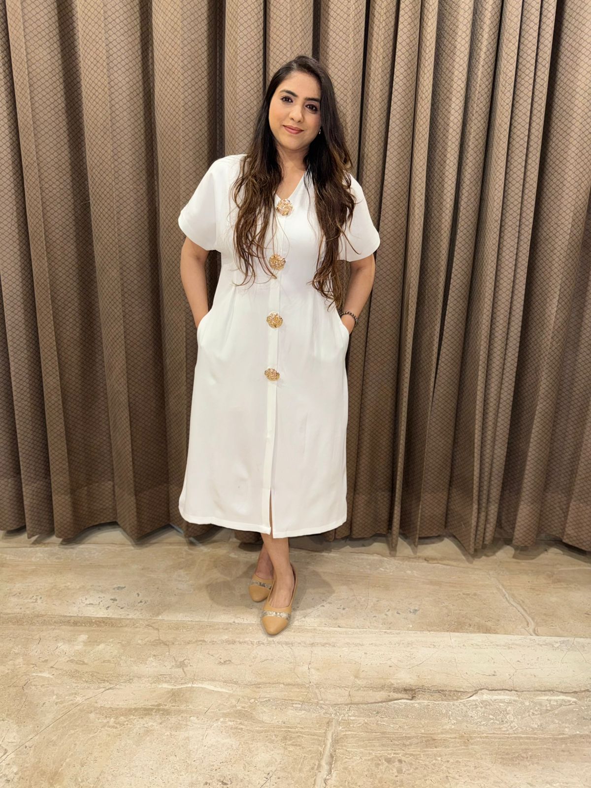 Beautiful White One piece dress with designer buttons
