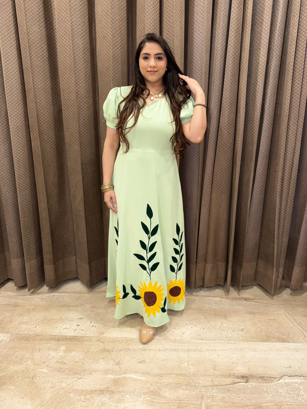 Green Midi dress with Aari work of sunflower detailing