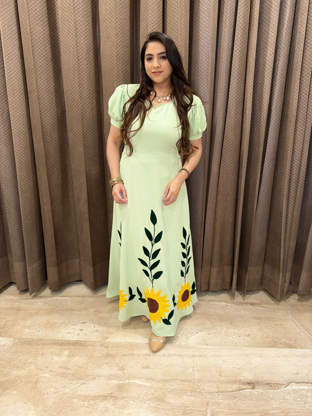 Green Midi dress with Aari work of sunflower detailing