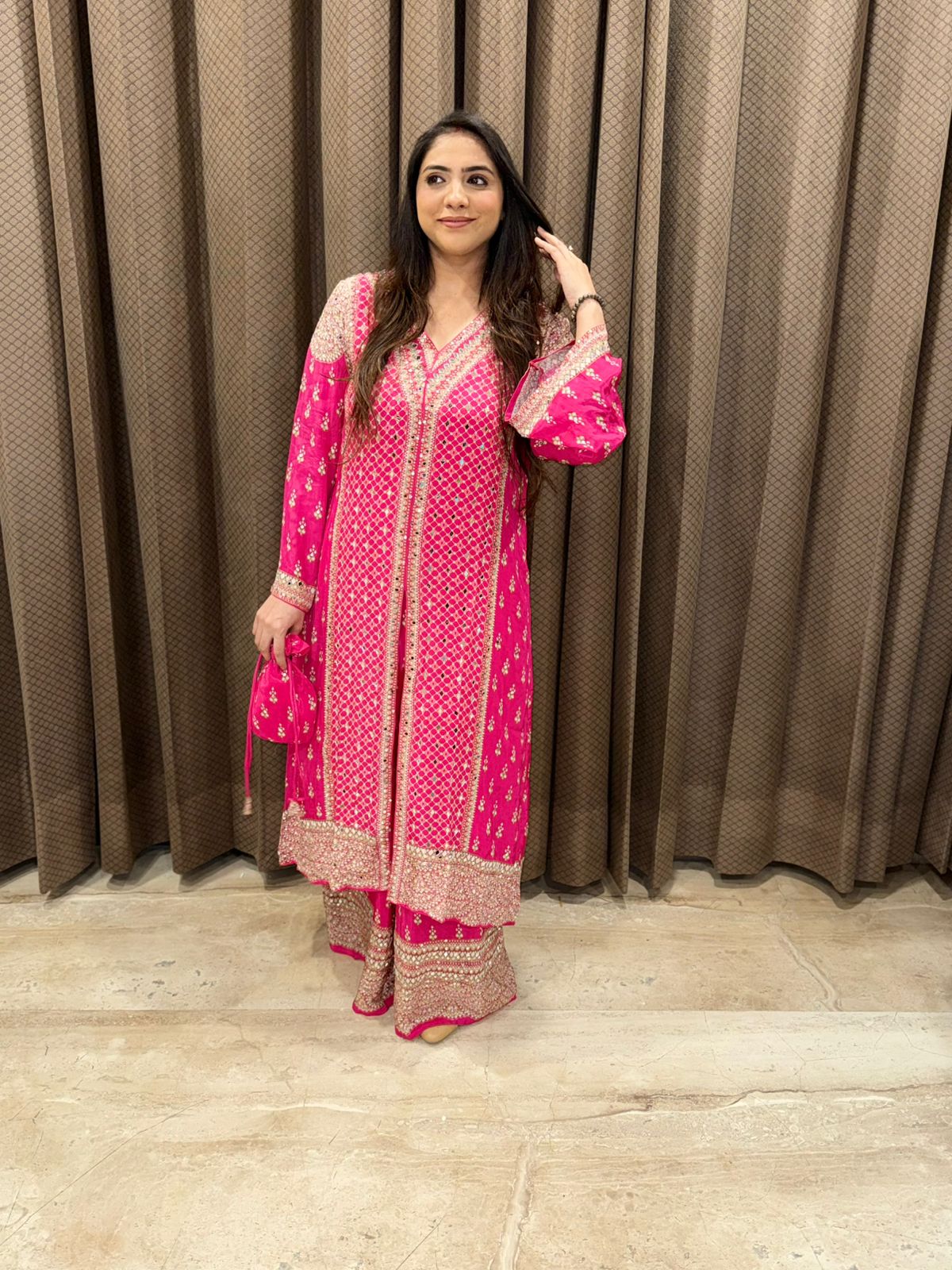 Designer Pink Indowestern style with mirror work & Potli