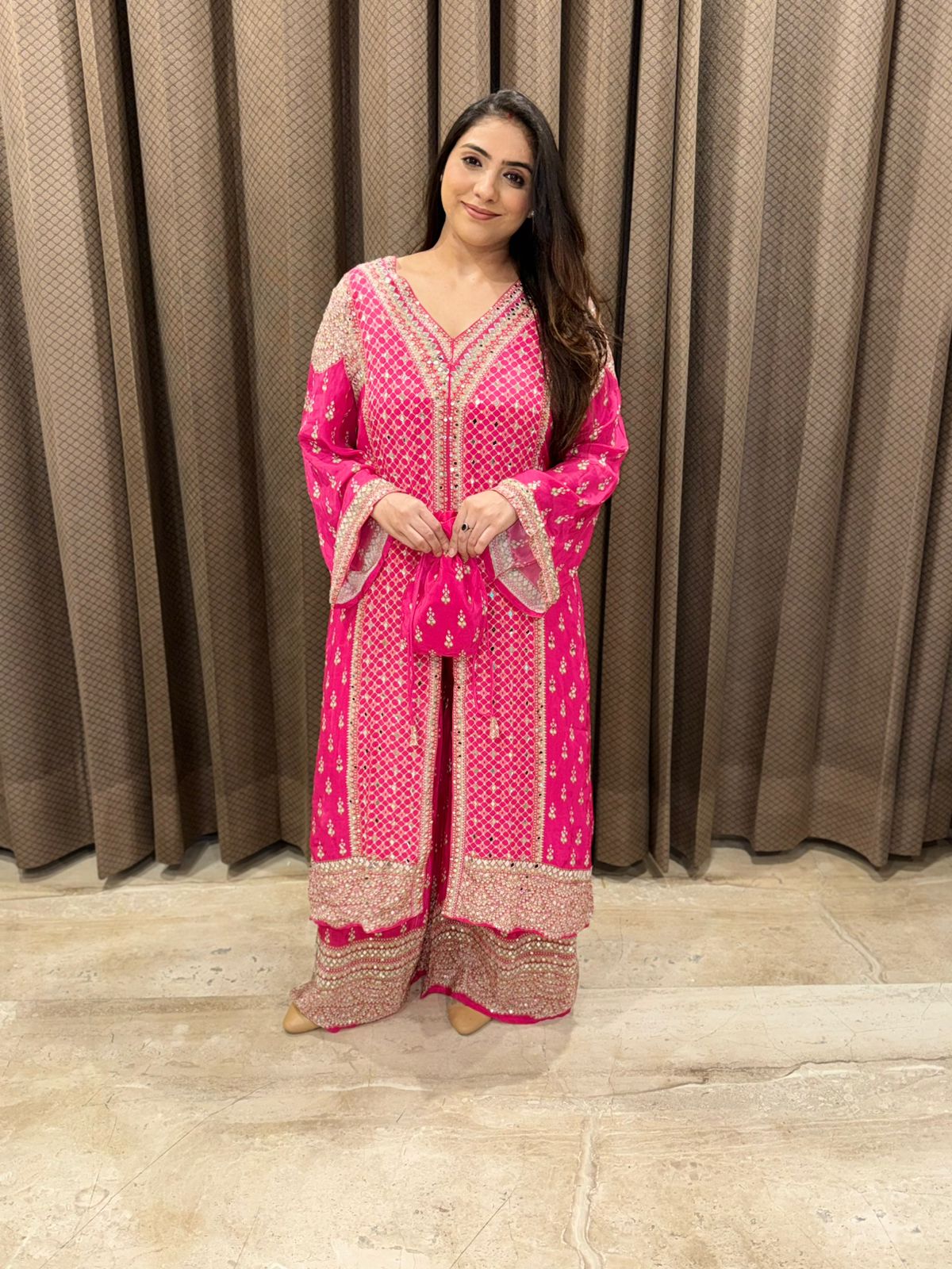 Designer Pink Indowestern style with mirror work & Potli