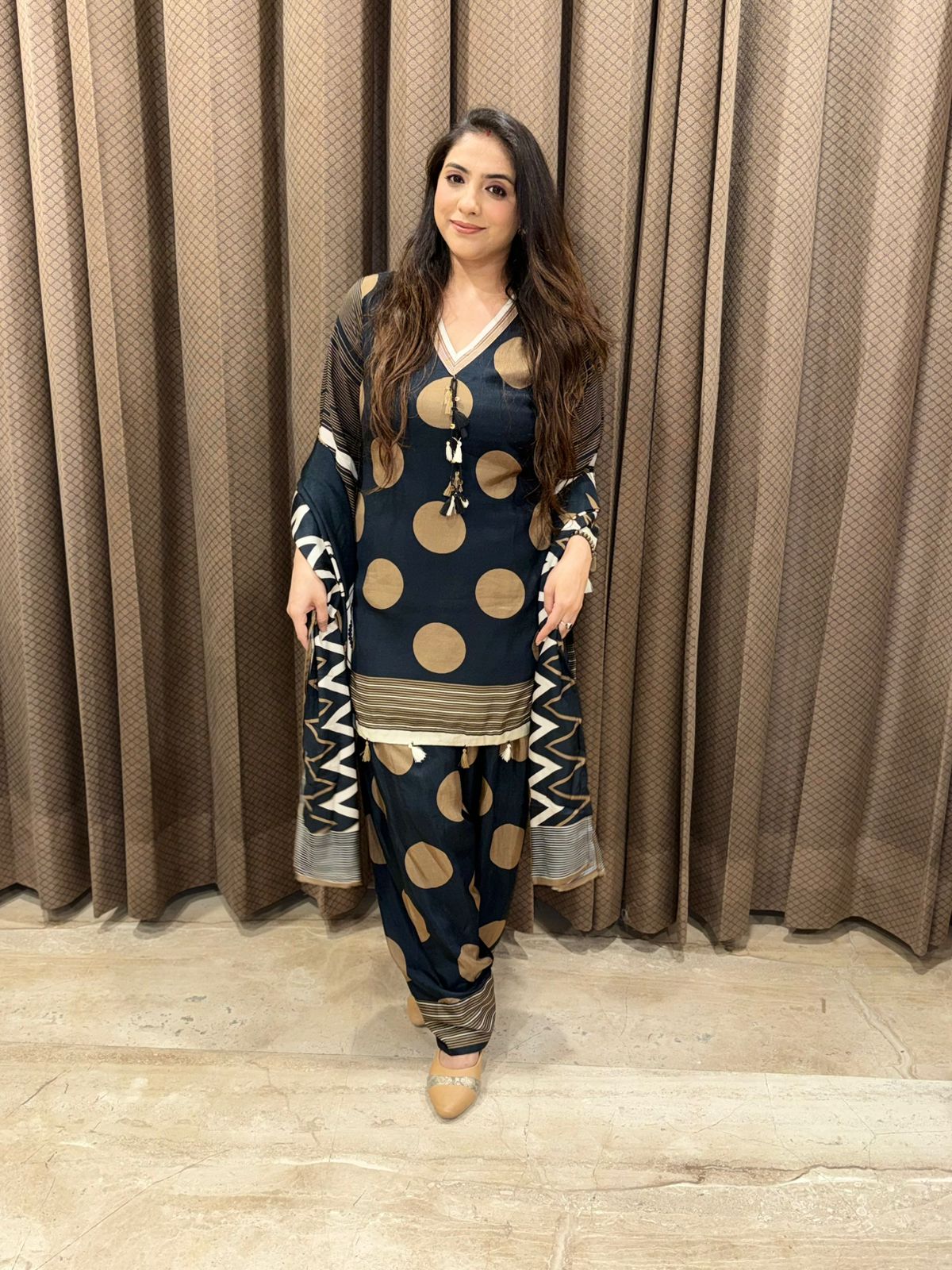 Elegant black and brown polka farsi set with dupatta and tassel detailing