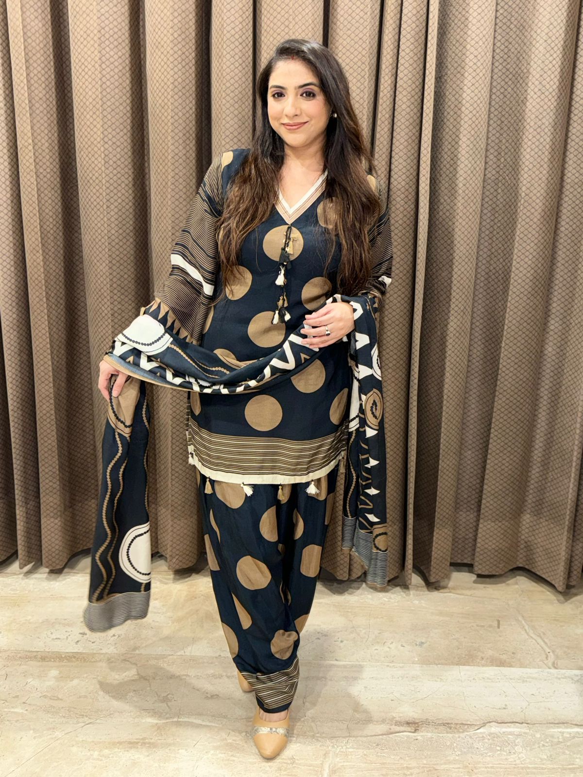 Elegant black and brown polka farsi set with dupatta and tassel detailing