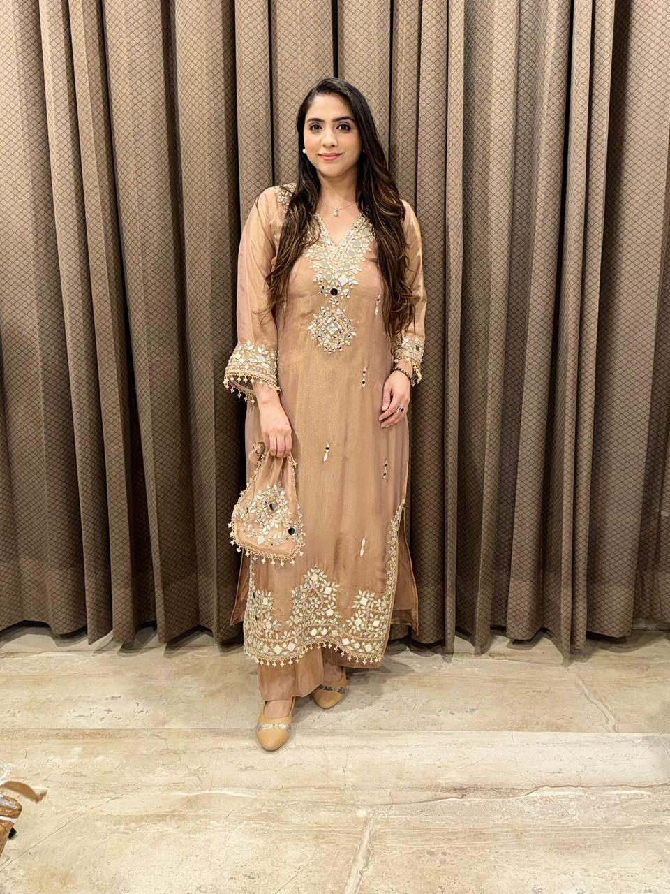 Designer Peach Long dress set with potli and mirror handwrork