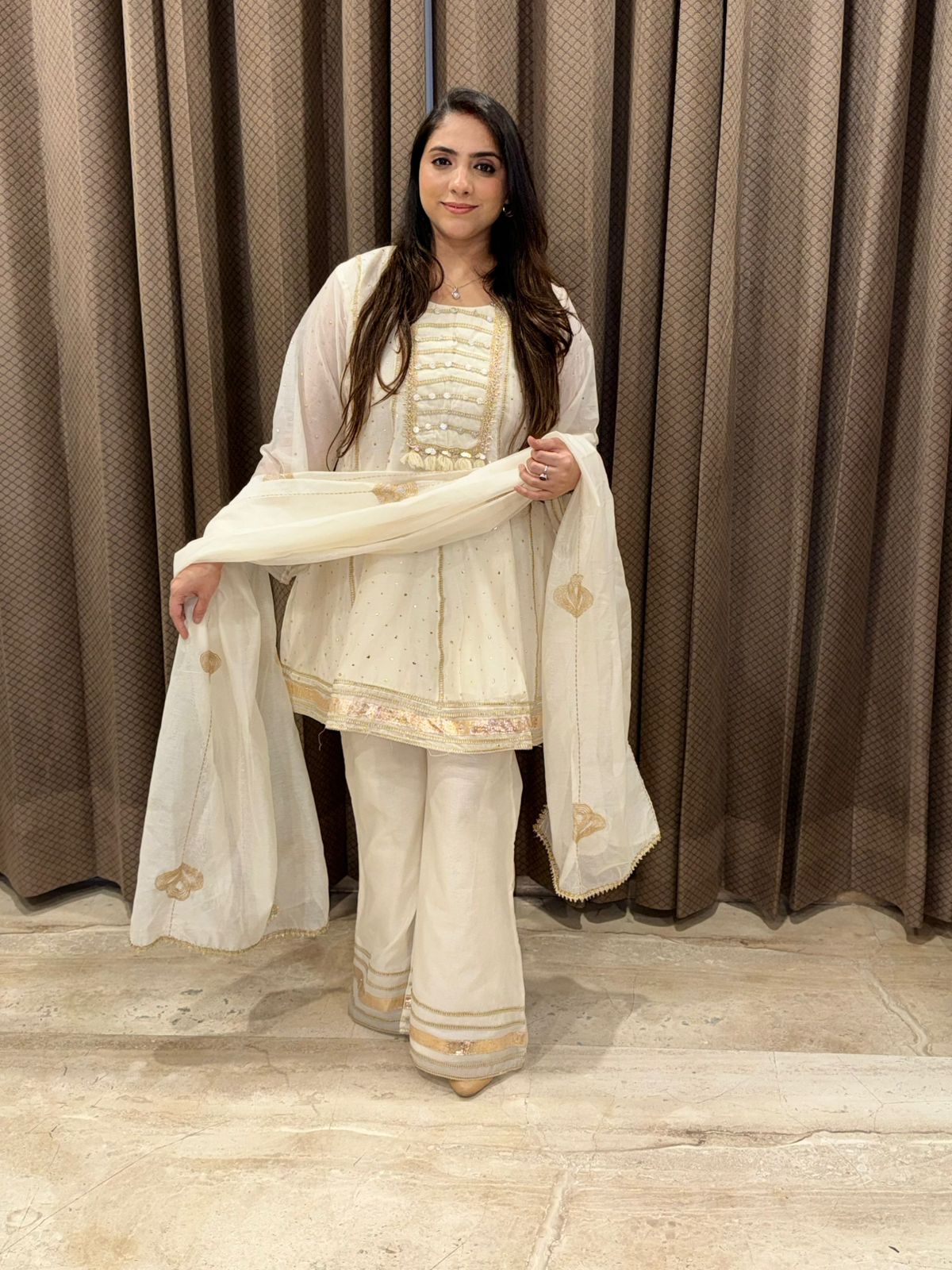 Gorgeous Off white Sharara set with Dupatta and handwork detailing