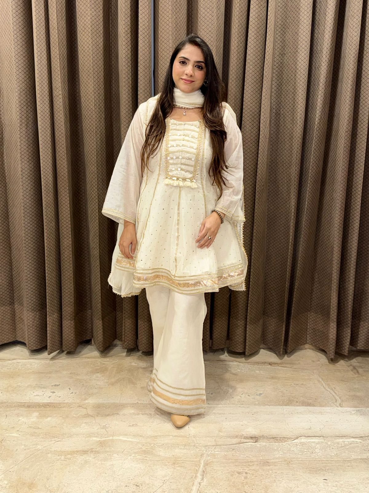 Gorgeous Off white Sharara set with Dupatta and handwork detailing