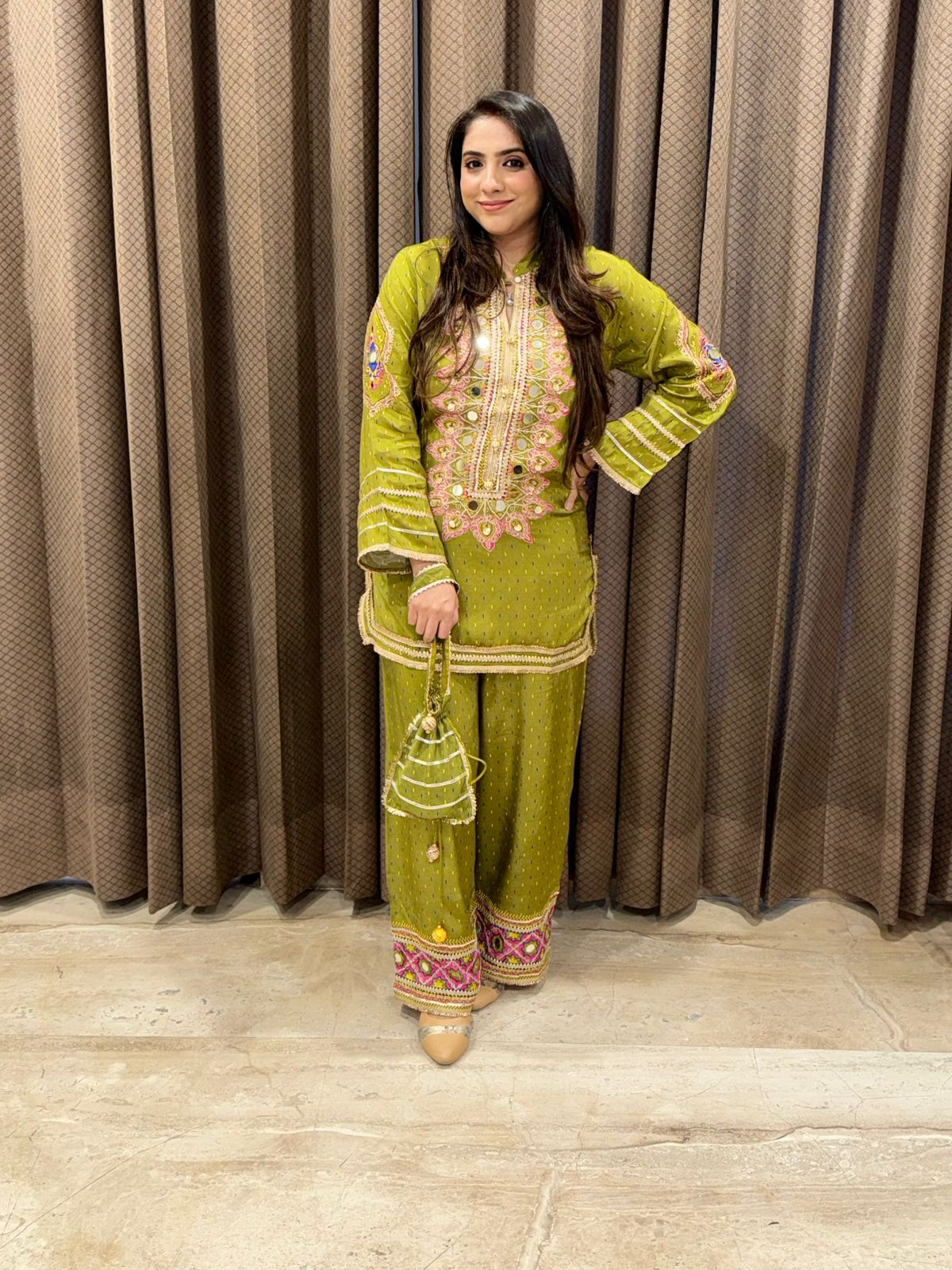 Designer Green with pink contrast suit set with handwork & Potli