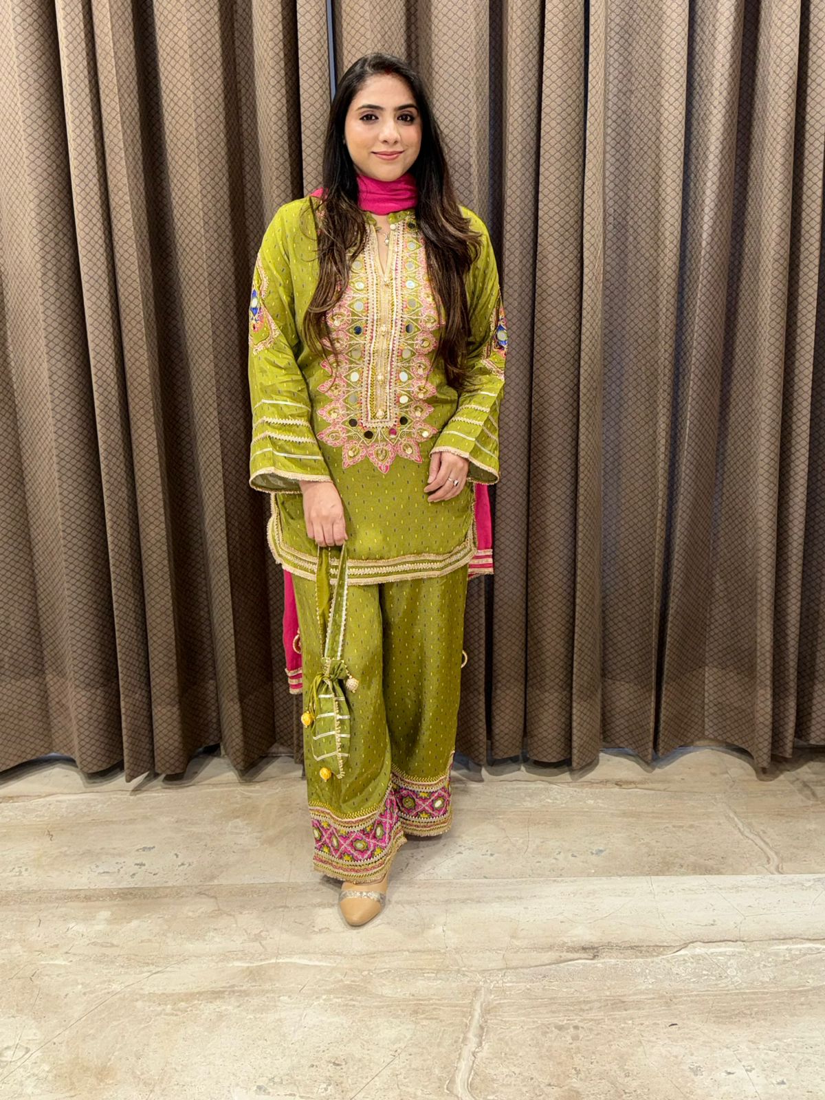 Designer Green with pink contrast suit set with handwork & Potli