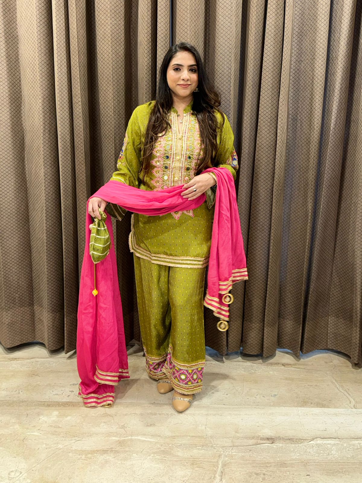 Designer Green with pink contrast suit set with handwork & Potli