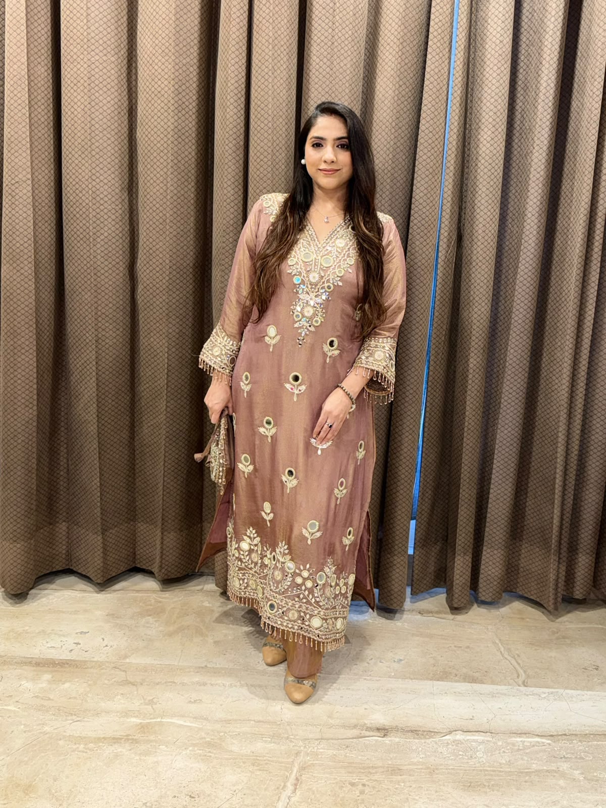 Designer Brown Long dress with potli and mirror handwork