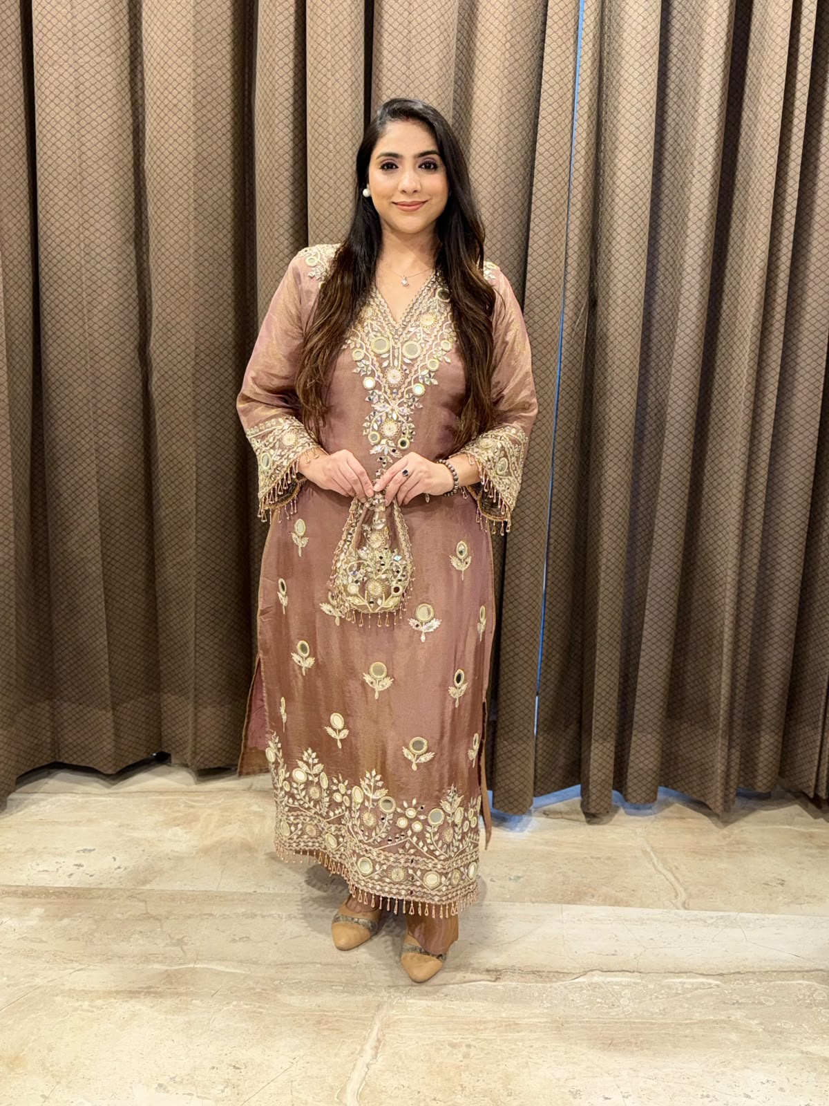 Designer Brown Long dress with potli and mirror handwork