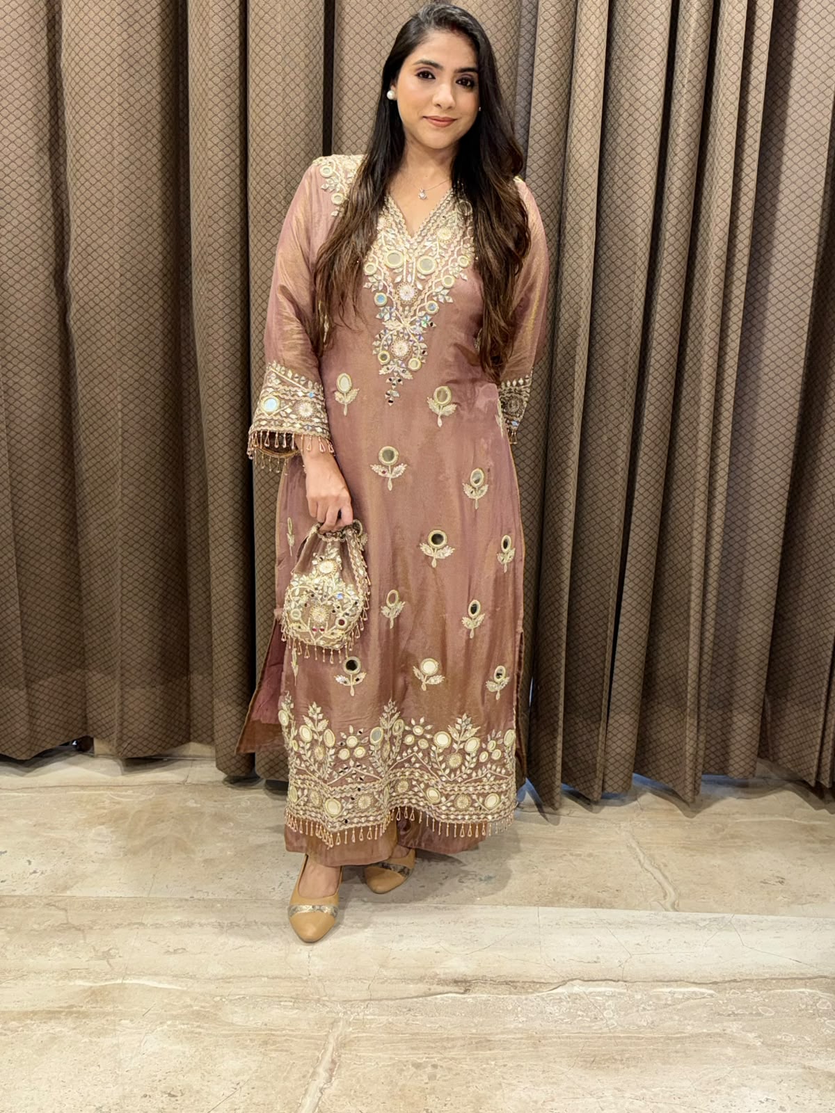 Designer Brown Long dress with potli and mirror handwork
