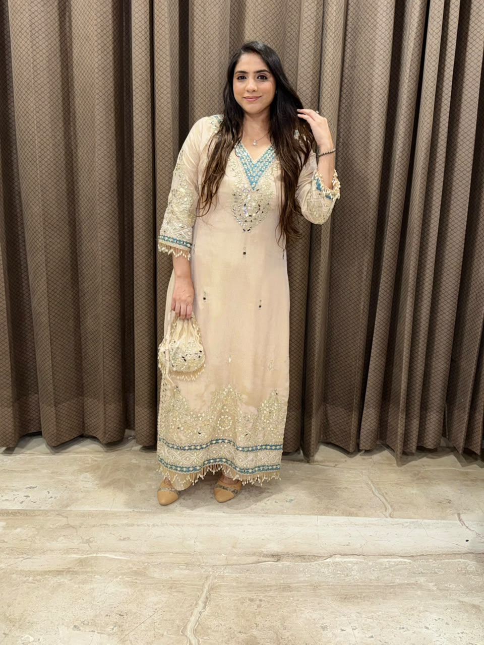 Designer Gold Dress with potli and pearl handwork