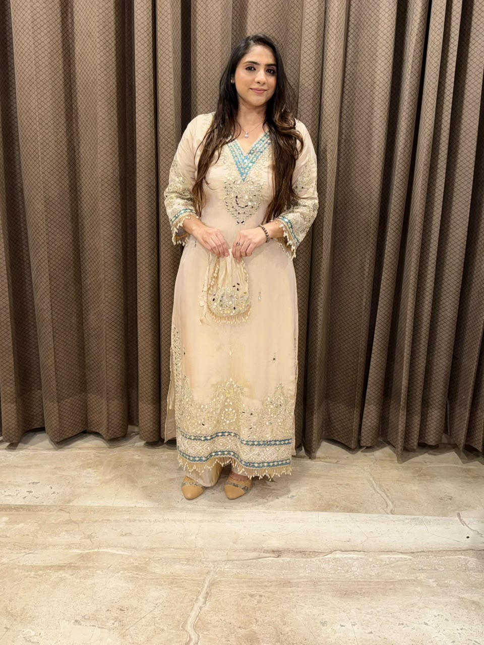 Designer Gold Dress with potli and pearl handwork