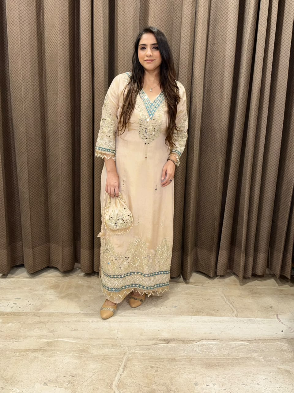 Designer Gold Dress with potli and pearl handwork