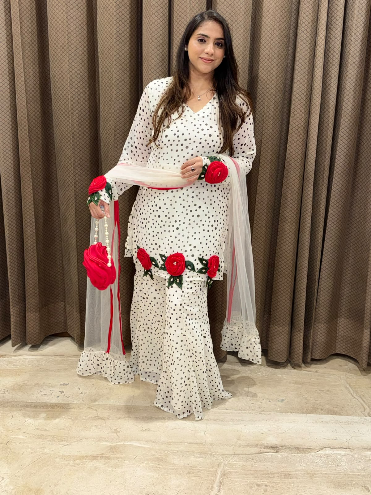 Exclusive White & black polka sharara set with flower handwork & bag