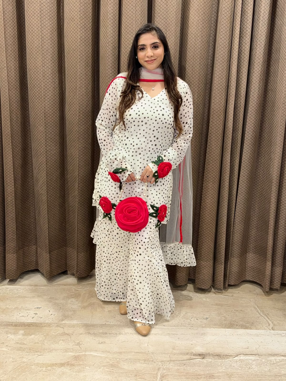 Exclusive White & black polka sharara set with flower handwork & bag