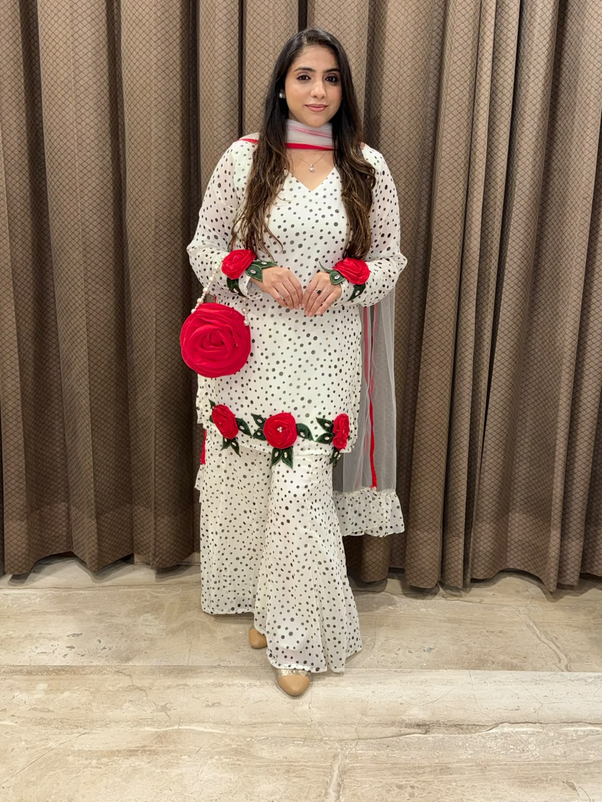 Exclusive White & black polka sharara set with flower handwork & bag