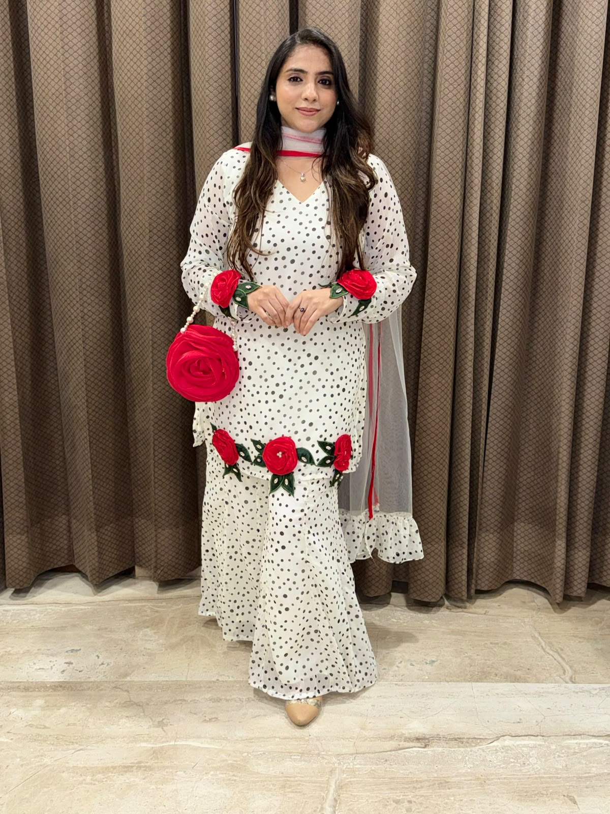 Exclusive White & black polka sharara set with flower handwork & bag