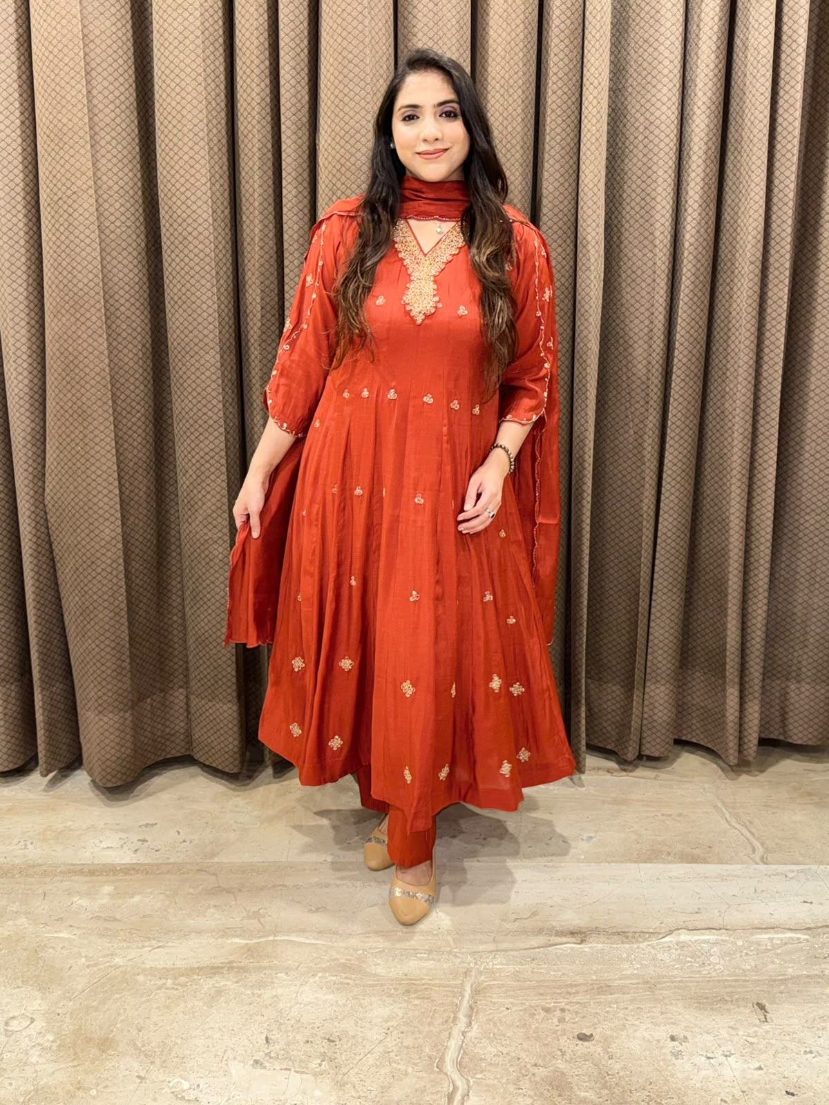 Rust elegant Anarkali set with designer handwork &Dupatta
