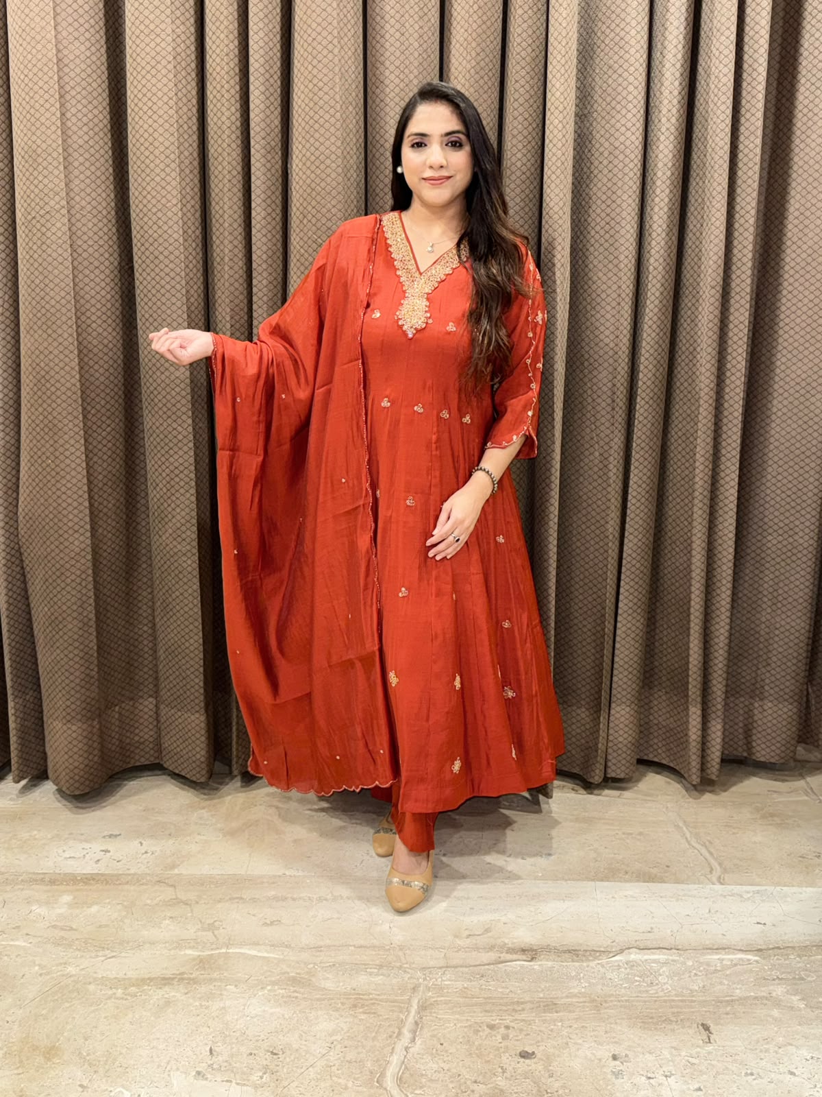 Rust elegant Anarkali set with designer handwork &Dupatta