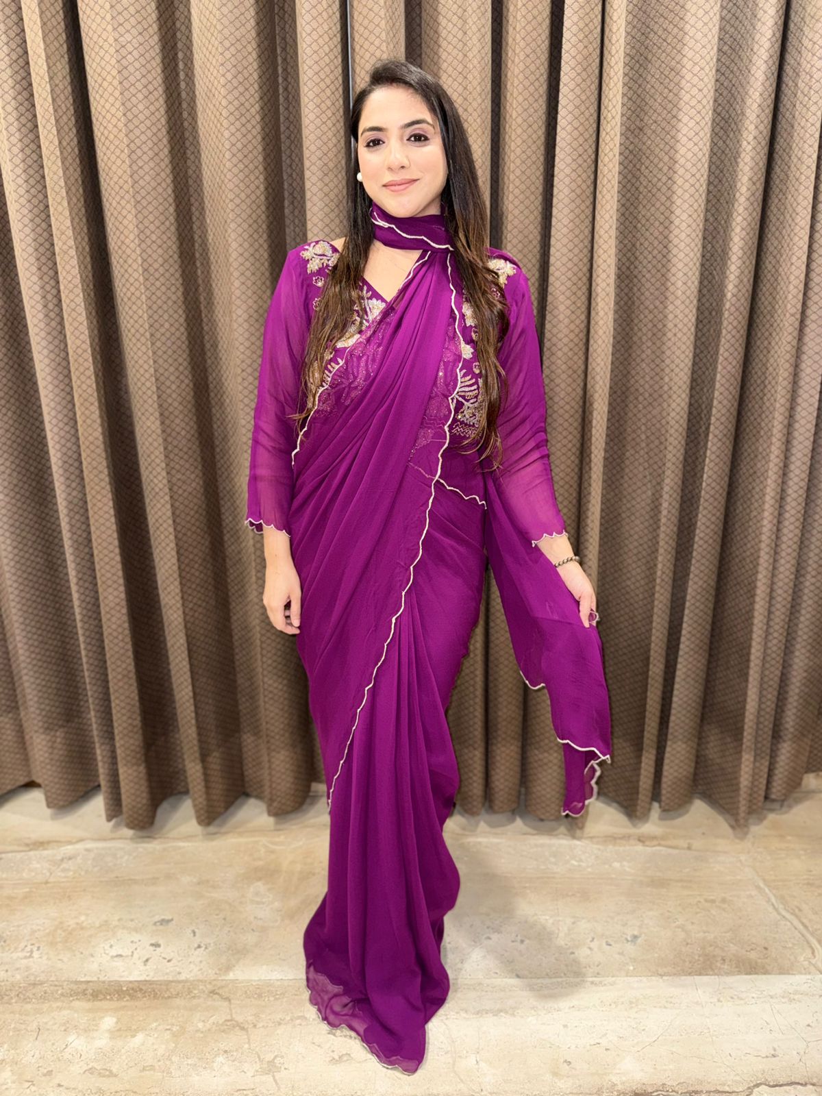 Plum Draped Saree with cutdana handwork blouse