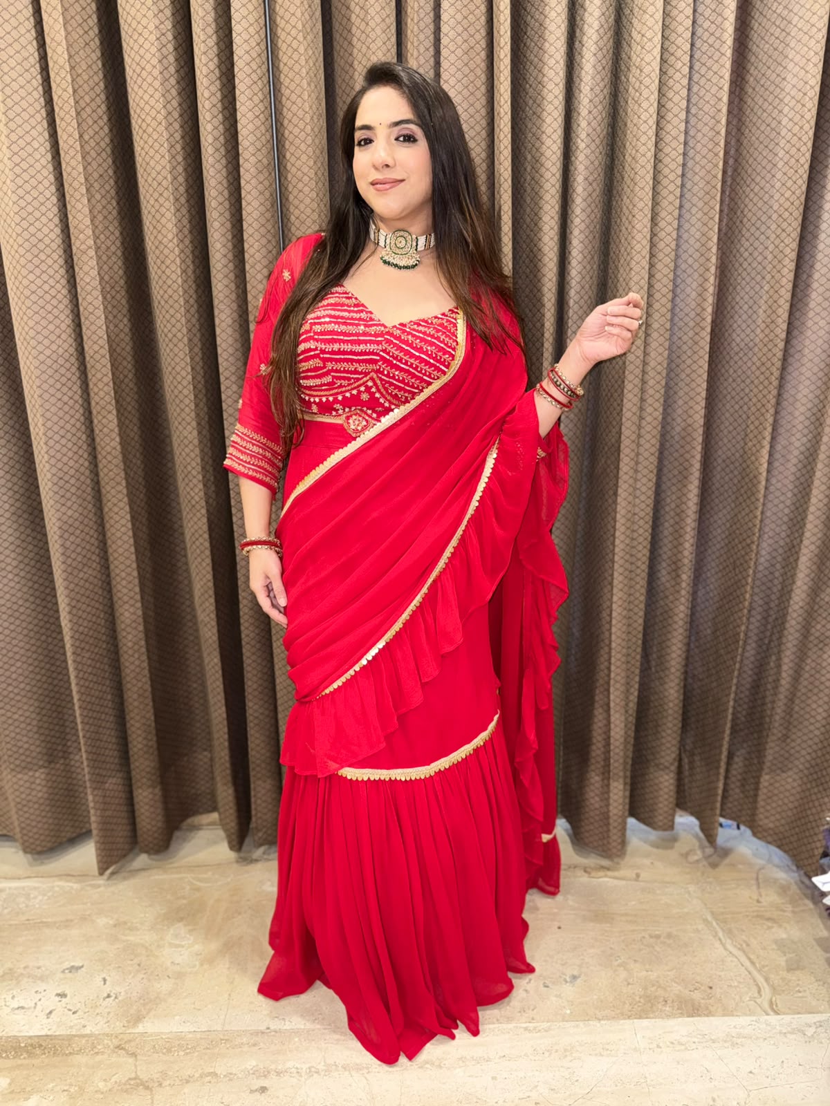 Gorgeous Red Drape Saree with Handwork Blouse & latkan