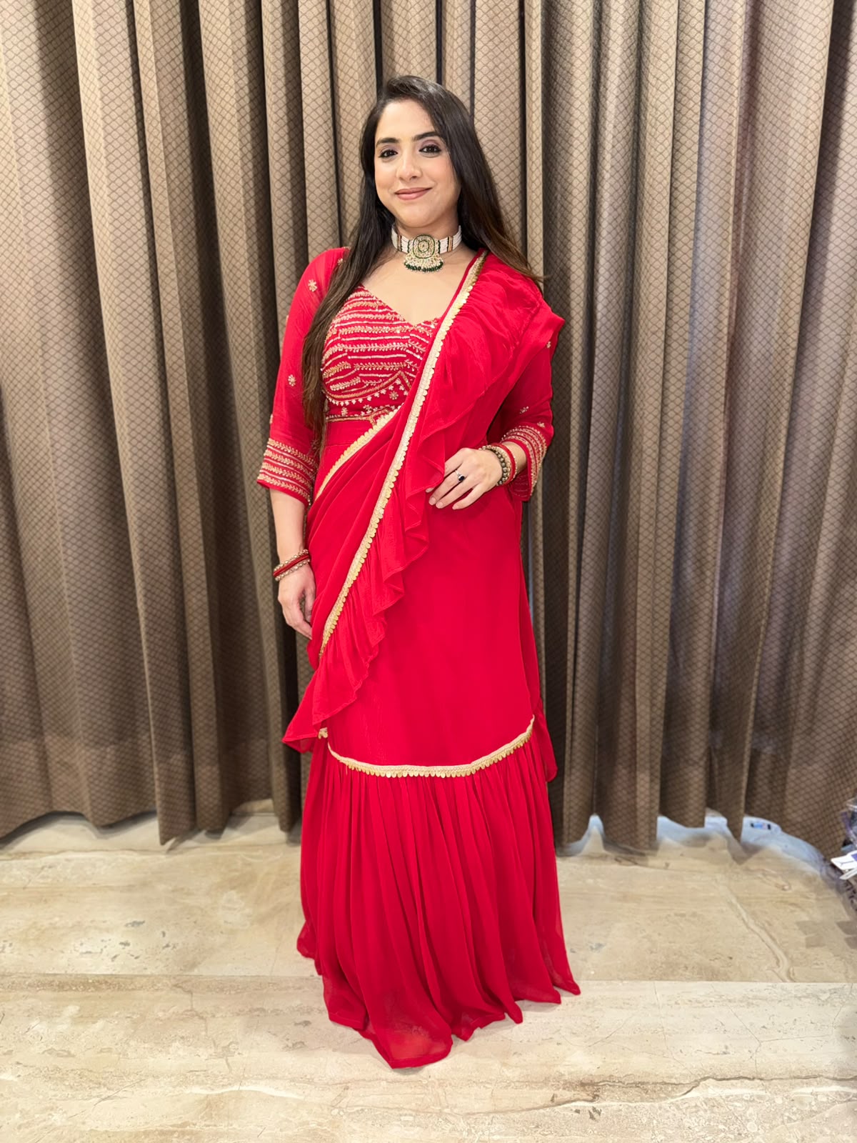 Gorgeous Red Drape Saree with Handwork Blouse & latkan