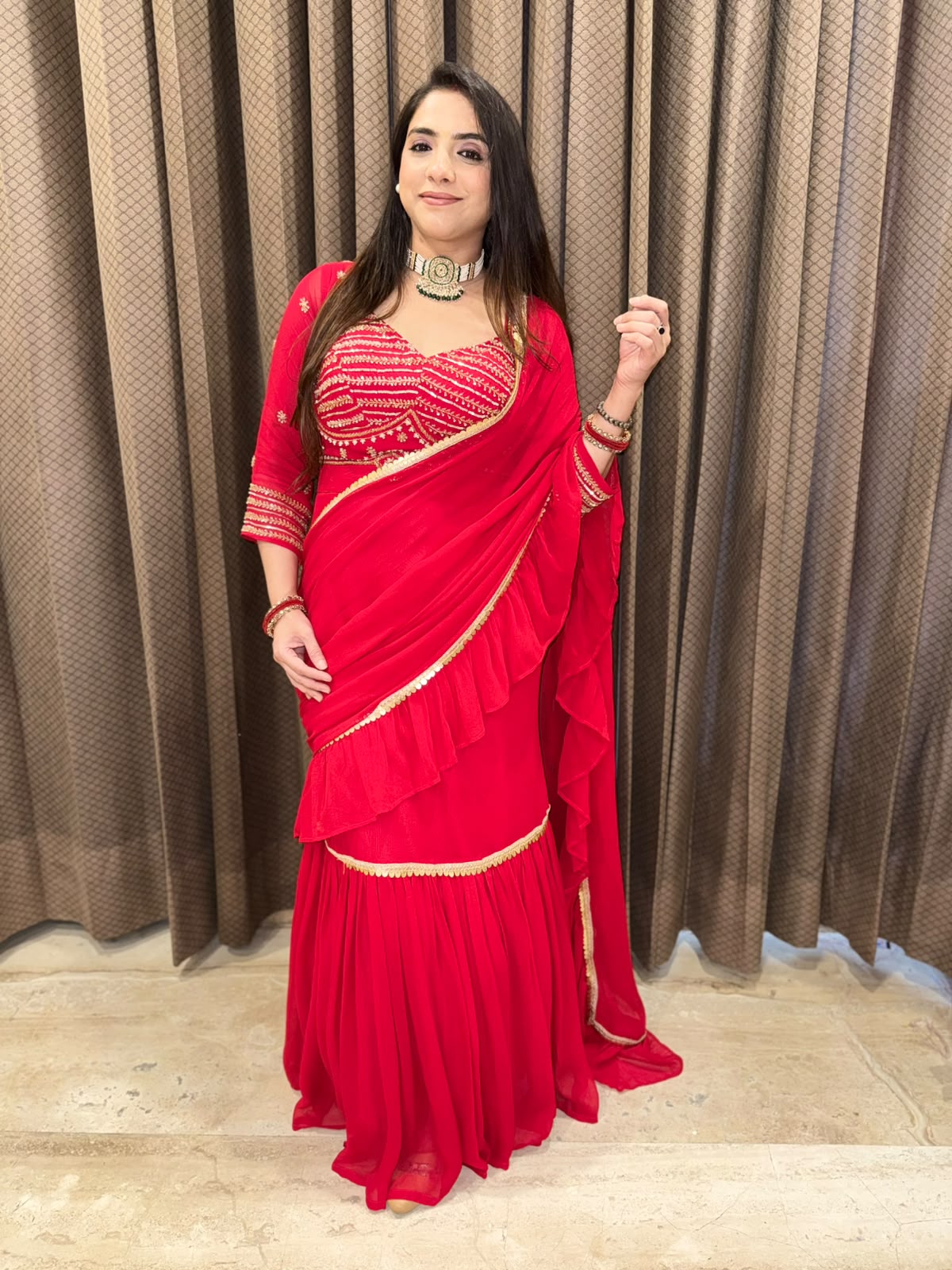 Gorgeous Red Drape Saree with Handwork Blouse & latkan