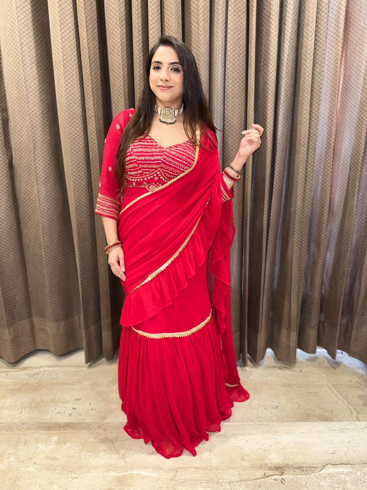 Gorgeous Red Drape Saree with Handwork Blouse & latkan