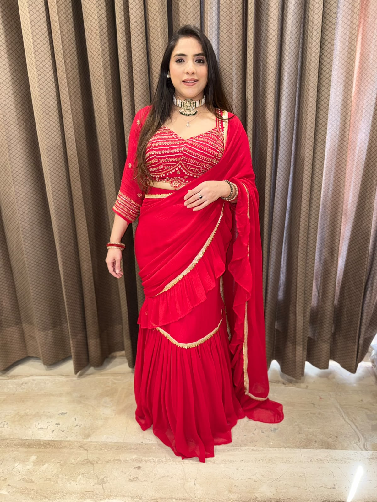 Gorgeous Red Drape Saree with Handwork Blouse & latkan