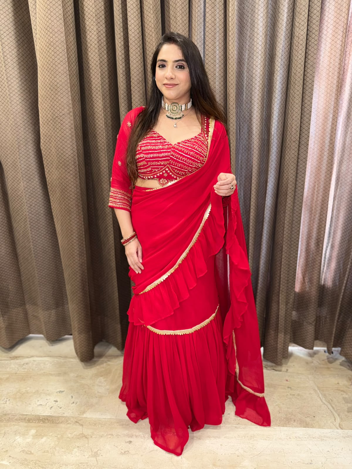 Gorgeous Red Drape Saree with Handwork Blouse & latkan