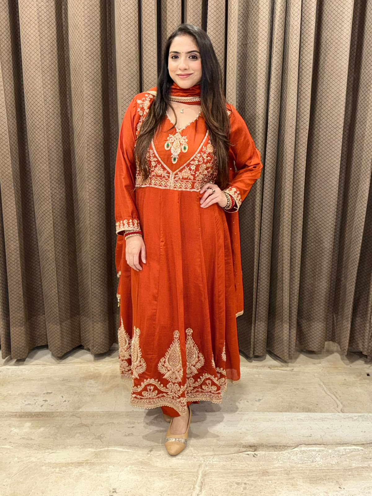 Gorgeous Rust Anarkali set with dupatta and handwork