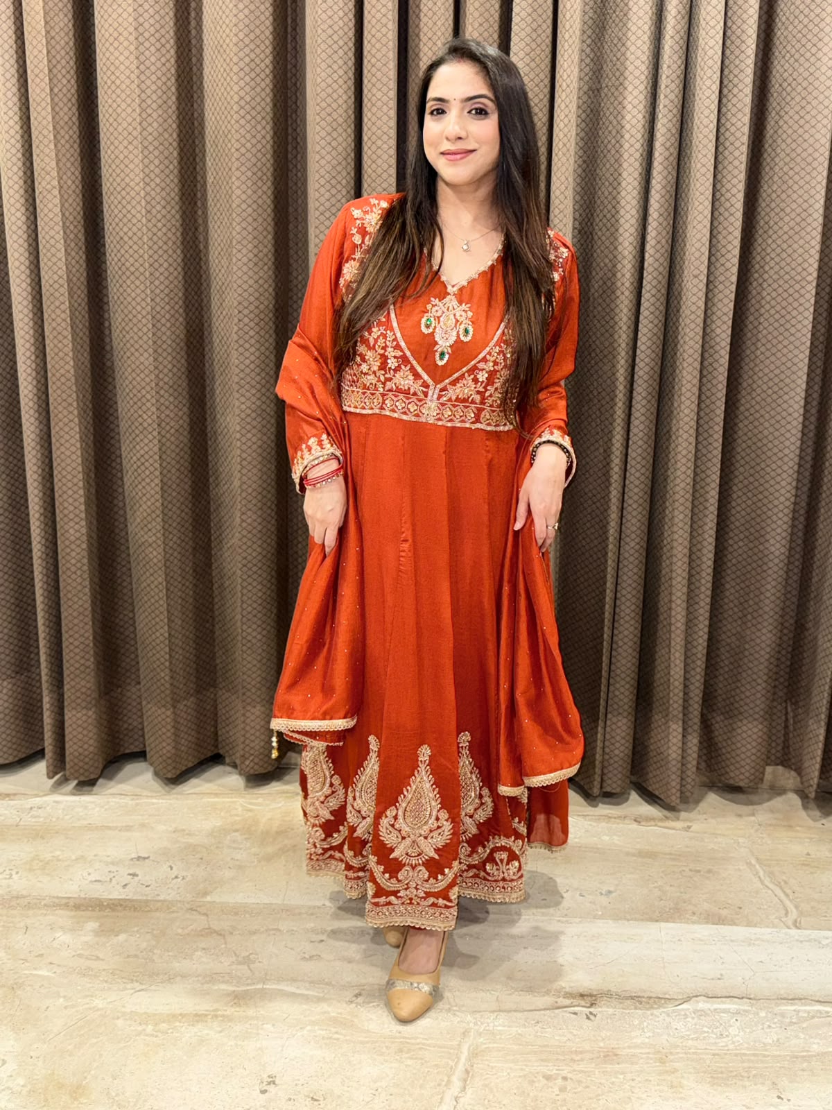 Gorgeous Rust Anarkali set with dupatta and handwork