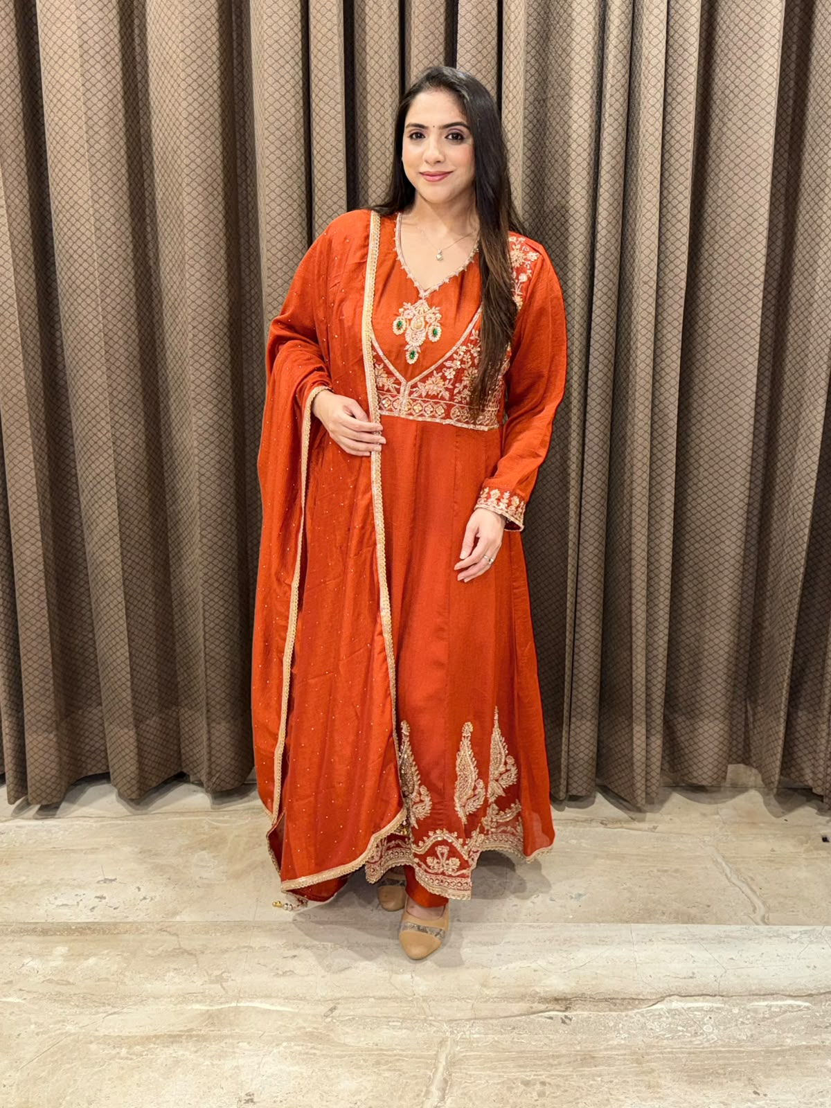 Gorgeous Rust Anarkali set with dupatta and handwork