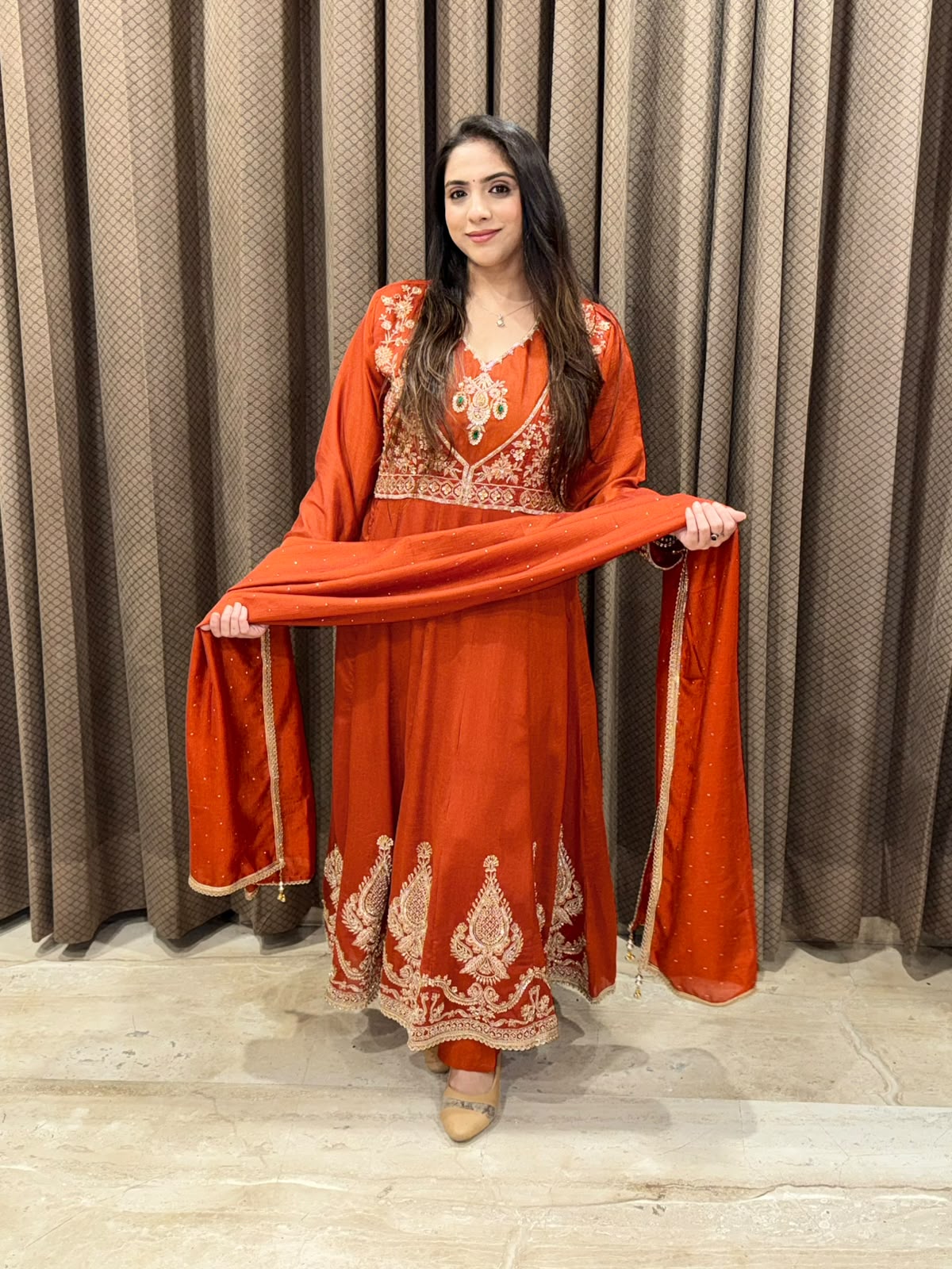 Gorgeous Rust Anarkali set with dupatta and handwork