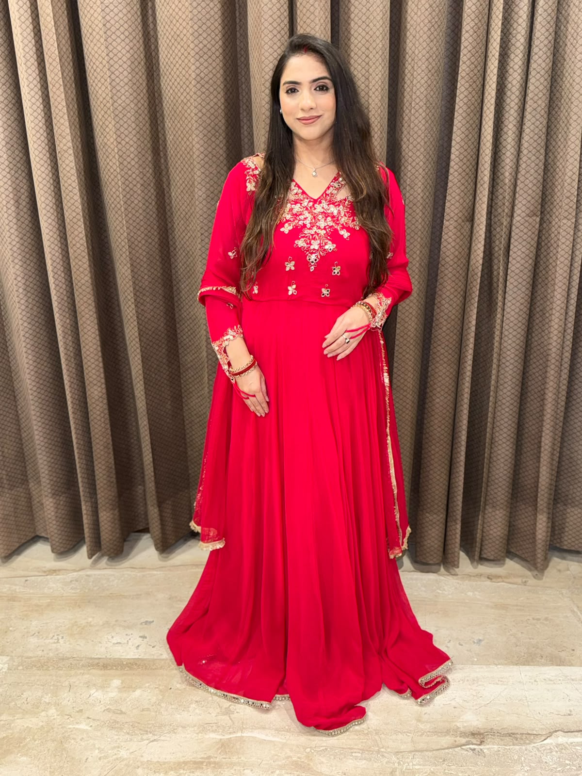 Red Anarkali suit with  Designer Sleeves, neck & handwork